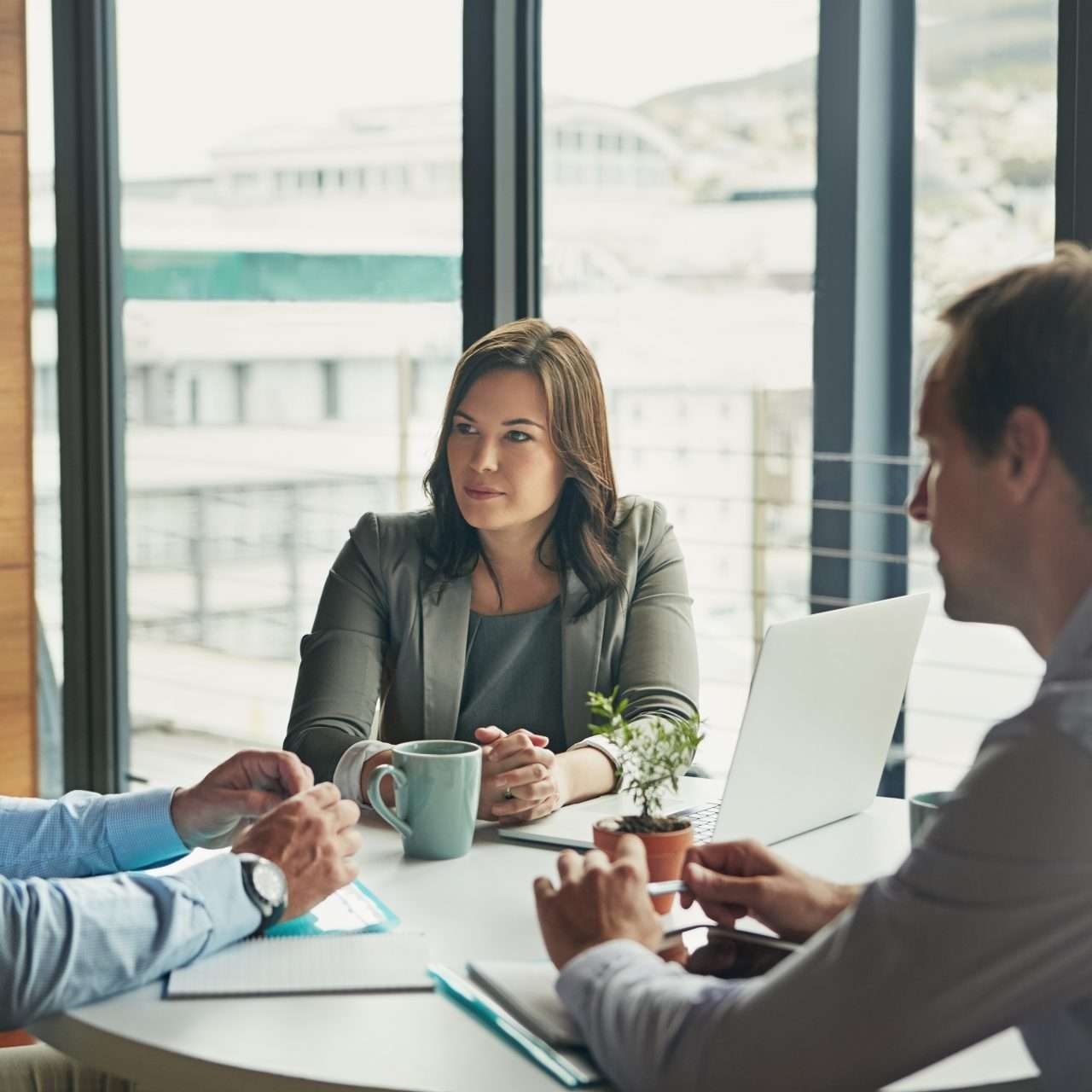 Meeting, talking and planning of business people in office for teamwork, management ideas and professional brainstorming. Manager, woman employee and clients listening, speaking or advice for project.